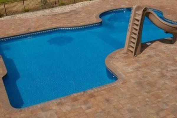 In ground pool with a Garrett liner