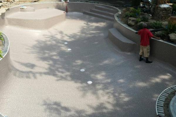 an in-progress installation of a perfect fit Garrett vinyl pool liner