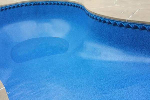a newly installed perfect fit Garrett vinyl pool liner