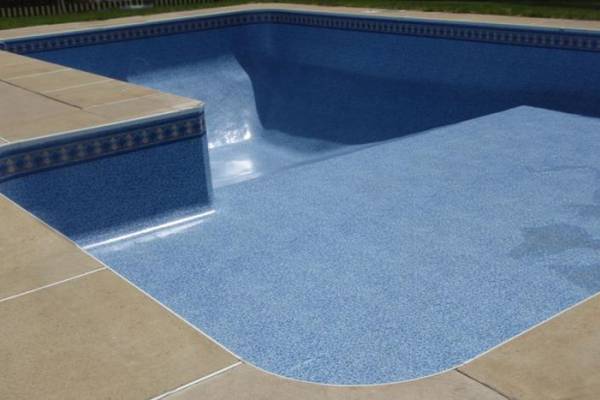 a newly installed perfect fit Garrett vinyl pool liner