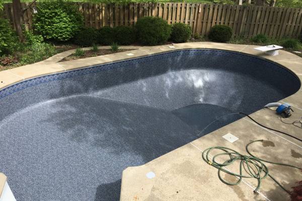 a newly installed perfect fit Garrett vinyl pool liner