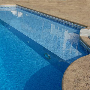 an in ground pool with a Garrett liner